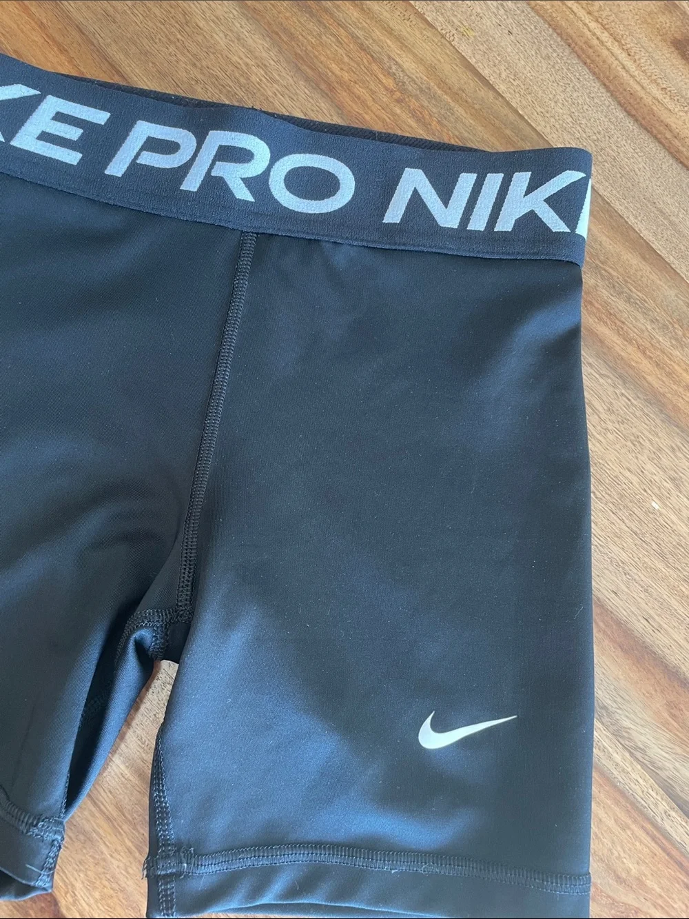 Nike Black Compression Shorts with White Swoosh